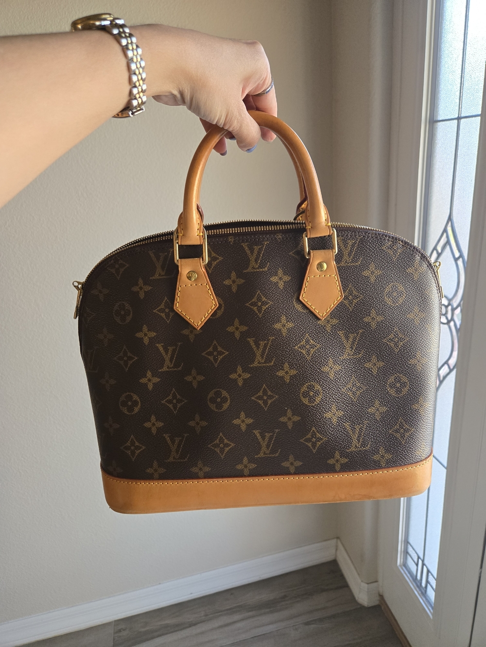 Authentic Louis Vuitton Monogram Alma Handbag in Brown/Tan